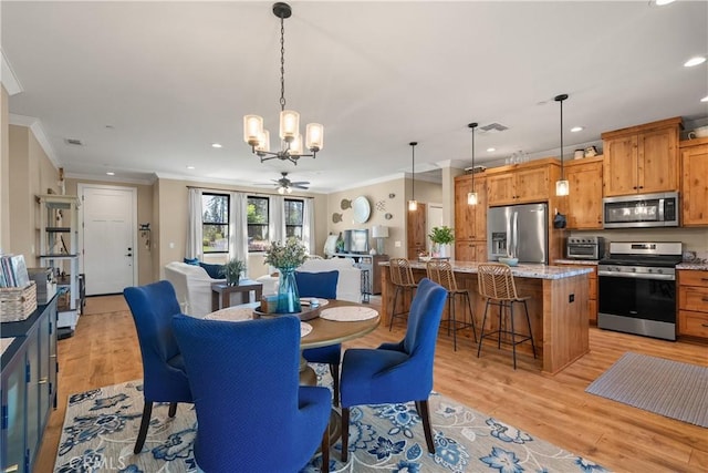 1622 Paradisewood Dr, Paradise, CA 95969 - dining area featuring crown molding, a chandelier, light wood finished floors, recessed lighting, and a ceiling fan