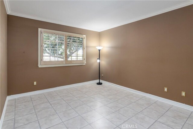 29515 Weeping Willow Dr, Agoura Hills, CA 91301 - spare room featuring crown molding, baseboards, and light tile patterned floors