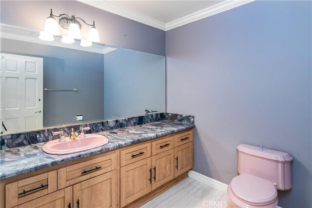 29515 Weeping Willow Dr, Agoura Hills, CA 91301 - bathroom featuring vanity, toilet, ornamental molding, baseboards, and tile patterned flooring