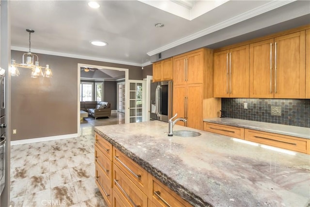 29515 Weeping Willow Dr, Agoura Hills, CA 91301 - kitchen with stainless steel fridge with ice dispenser, a sink, stone counters, brown cabinetry, and decorative backsplash