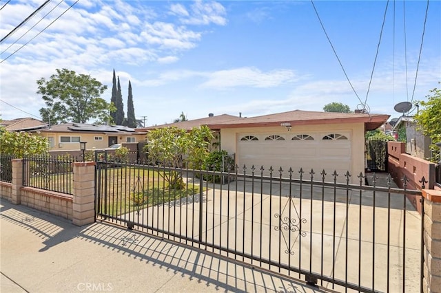 143581/2 Jeanette Ln, Baldwin Park, CA 91706 - ranch-style home featuring concrete driveway, an attached garage, and stucco siding
