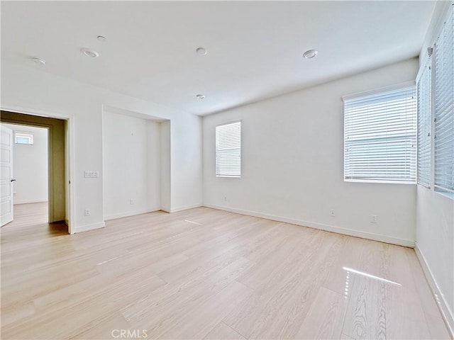 229 Radial, Irvine, CA 92618 - empty room with light wood-style floors and baseboards