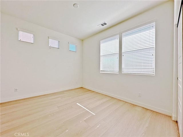 229 Radial, Irvine, CA 92618 - unfurnished room featuring wood finished floors and baseboards