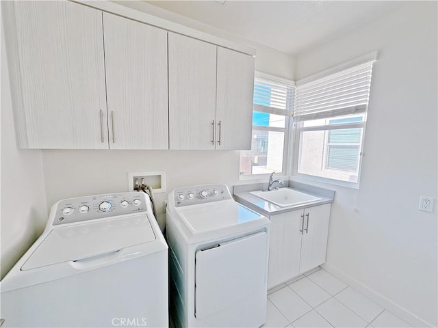 229 Radial, Irvine, CA 92618 - laundry area with separate washer and dryer, cabinet space, light tile patterned flooring, and baseboards
