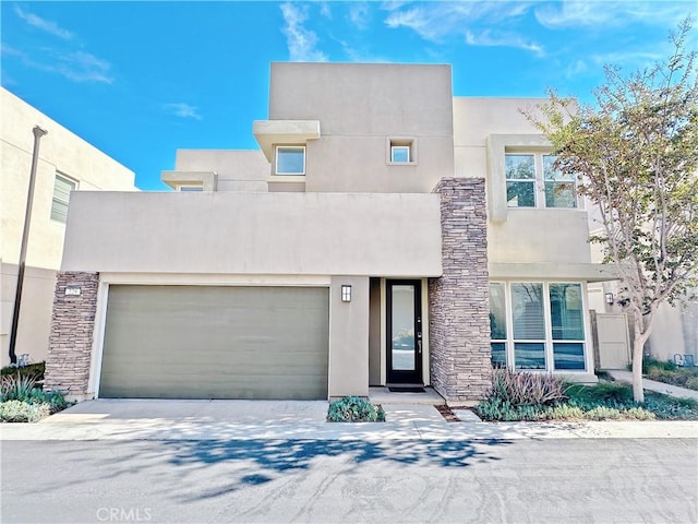 229 Radial, Irvine, CA 92618 - view of front facade with stone siding, stucco siding, and a garage