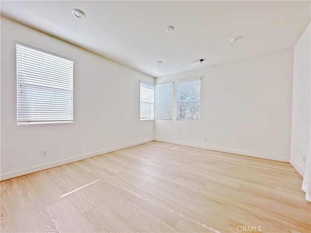 229 Radial, Irvine, CA 92618 - spare room with light wood-style floors and baseboards