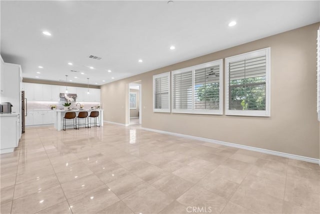 9936 Pear Dr, Westminster, CA 92683 - living area with recessed lighting and baseboards