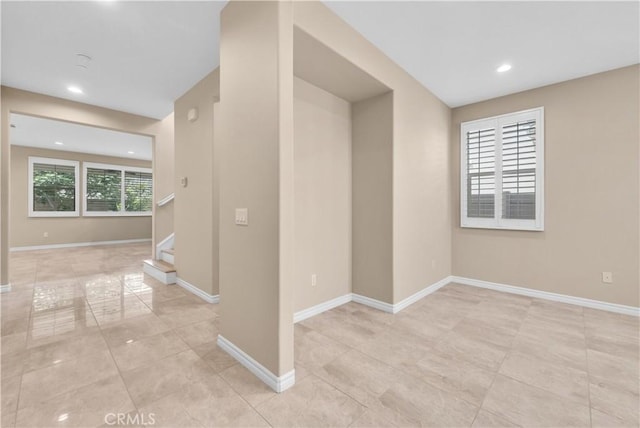 9936 Pear Dr, Westminster, CA 92683 - spare room with stairs, recessed lighting, baseboards, and light tile patterned floors