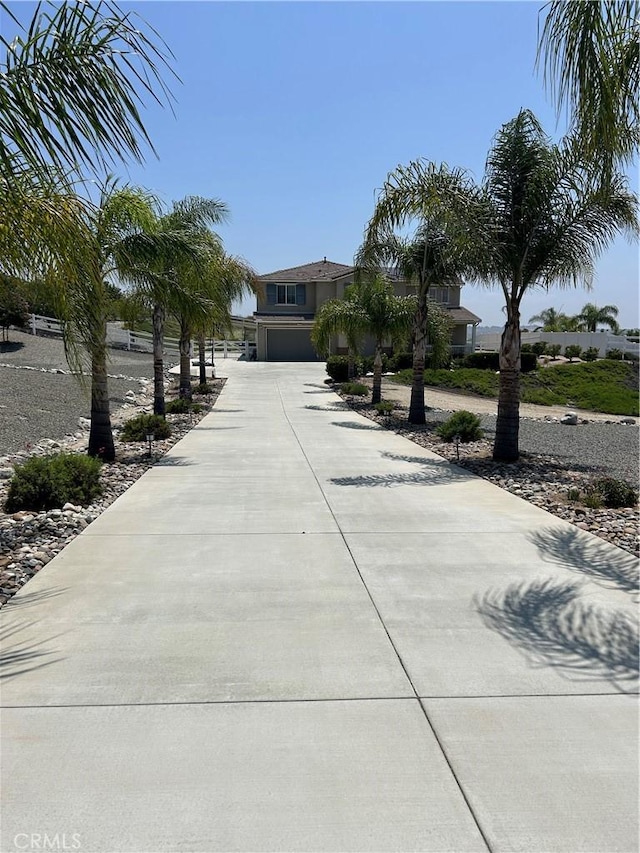 17426 Fairbreeze Ct, Riverside, CA 92504 - view of front of property with an attached garage and concrete driveway