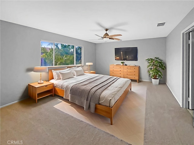 7411 Bull Run Pl, Fontana, CA 92336 - carpeted bedroom with baseboards and ceiling fan