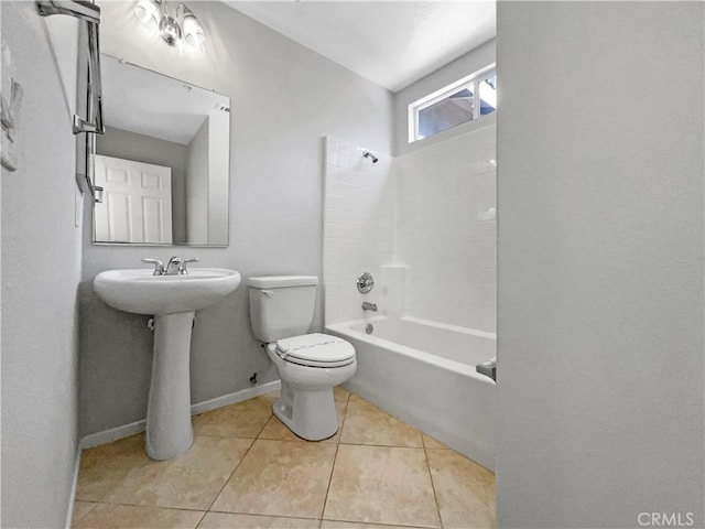 7411 Bull Run Pl, Fontana, CA 92336 - bathroom featuring toilet, shower / washtub combination, tile patterned floors, baseboards, and a sink