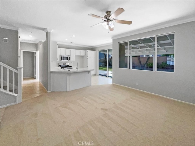 7411 Bull Run Pl, Fontana, CA 92336 - unfurnished living room featuring light carpet, crown molding, a ceiling fan, stairs, and baseboards