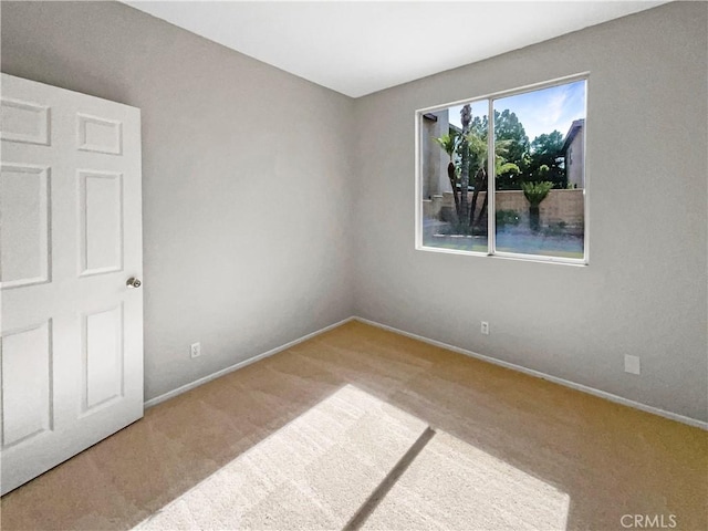 7411 Bull Run Pl, Fontana, CA 92336 - carpeted spare room featuring baseboards