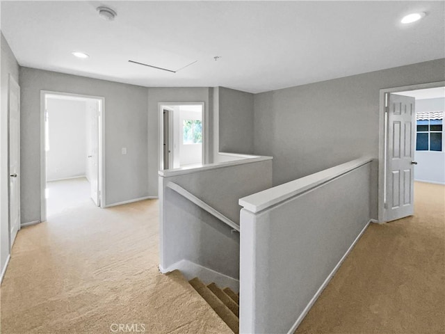 7411 Bull Run Pl, Fontana, CA 92336 - corridor with an upstairs landing, light colored carpet, baseboards, and recessed lighting