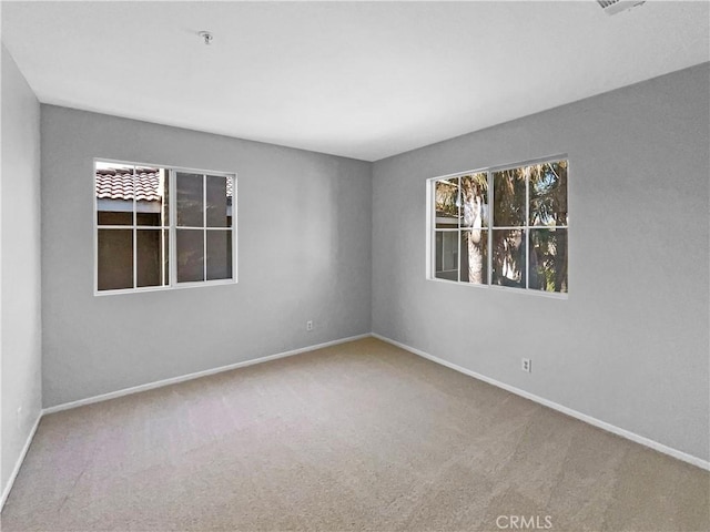 7411 Bull Run Pl, Fontana, CA 92336 - empty room with carpet floors, baseboards, and fire sprinkler in ceiling
