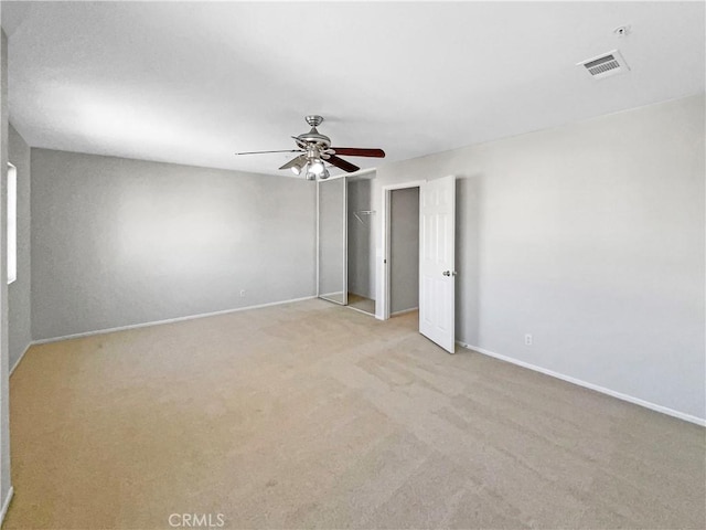 7411 Bull Run Pl, Fontana, CA 92336 - empty room featuring a ceiling fan, light carpet, and baseboards