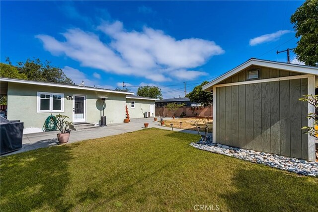 365 N Lime St, Orange, CA 92868 - rear view of house featuring entry steps, a patio, and stucco siding