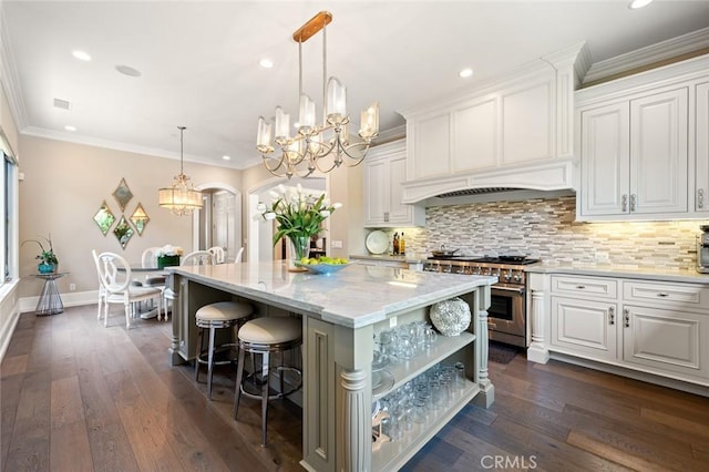 2108 S 2nd Ave, Arcadia, CA 91006 - kitchen with high end range, a chandelier, white cabinetry, a center island, and recessed lighting