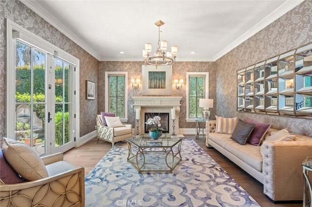 2108 S 2nd Ave, Arcadia, CA 91006 - living area featuring wallpapered walls, wood finished floors, a chandelier, ornamental molding, and a fireplace