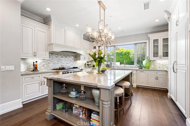2108 S 2nd Ave, Arcadia, CA 91006 - kitchen featuring a chandelier, white cabinetry, open shelves, a kitchen bar, and crown molding