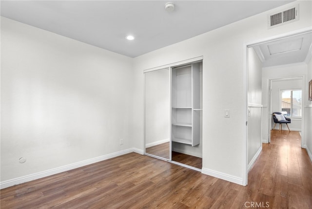18165 Sharon Cir, Yorba Linda, CA 92886 - unfurnished bedroom with wood finished floors, a closet, ornamental molding, and recessed lighting