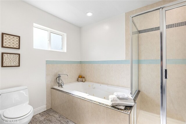 18165 Sharon Cir, Yorba Linda, CA 92886 - bathroom with a whirlpool tub, a shower stall, and wood finished floors