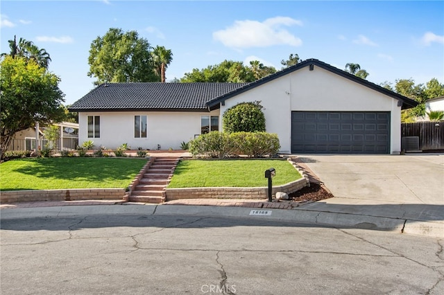 18165 Sharon Cir, Yorba Linda, CA 92886 - ranch-style home featuring stucco siding, an attached garage, driveway, a tiled roof, and central air condition unit