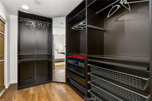 18165 Sharon Cir, Yorba Linda, CA 92886 - walk in closet featuring wood finished floors