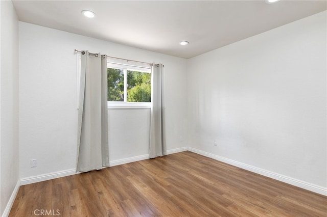 18165 Sharon Cir, Yorba Linda, CA 92886 - empty room featuring wood finished floors and recessed lighting