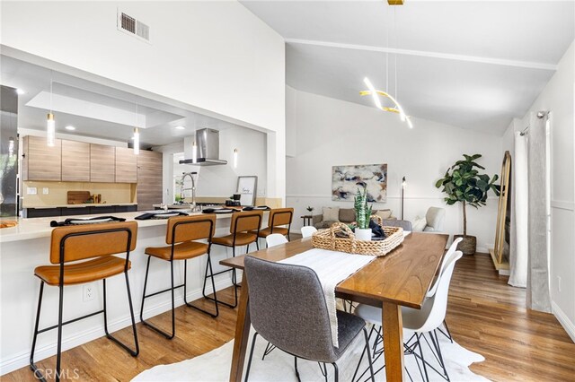 18165 Sharon Cir, Yorba Linda, CA 92886 - dining area featuring light wood finished floors and lofted ceiling