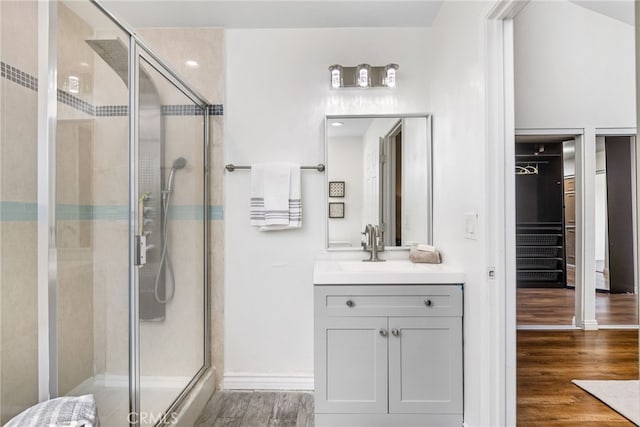18165 Sharon Cir, Yorba Linda, CA 92886 - full bath with a shower stall, vanity, and wood finished floors