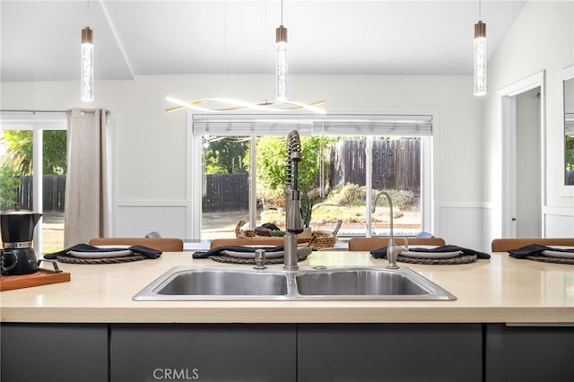 18165 Sharon Cir, Yorba Linda, CA 92886 - kitchen with hanging light fixtures, light countertops, and gray cabinets
