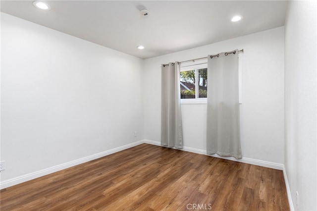18165 Sharon Cir, Yorba Linda, CA 92886 - empty room with wood finished floors, recessed lighting, and a smoke detector