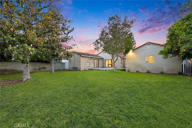 314 S Old Ranch Rd, Arcadia, CA 91007 - back of property at dusk featuring stucco siding and central AC unit