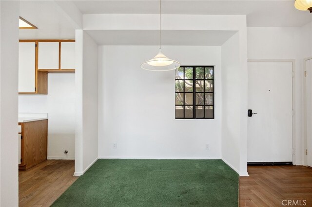 221 S Oak Knoll Ave Unit 308, Pasadena, CA 91101 - unfurnished dining area with baseboards