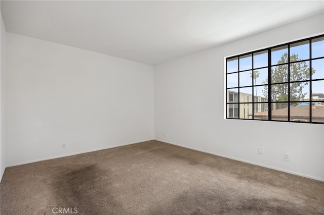 221 S Oak Knoll Ave Unit 308, Pasadena, CA 91101 - carpeted empty room featuring baseboards