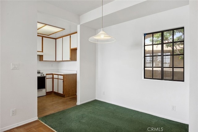 221 S Oak Knoll Ave Unit 308, Pasadena, CA 91101 - unfurnished dining area with baseboards