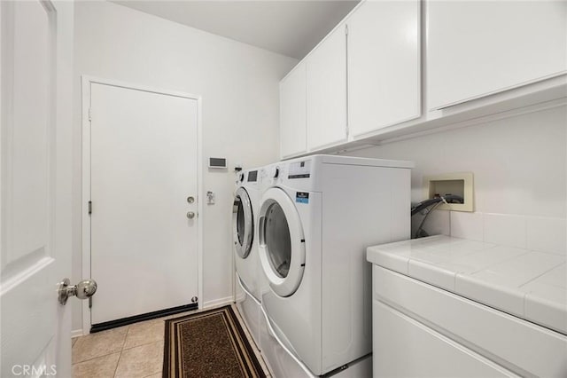 39798 Fairview Ct, Murrieta, CA 92563 - washroom featuring cabinet space, separate washer and dryer, and light tile patterned floors