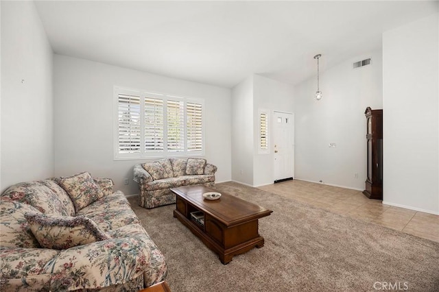 39798 Fairview Ct, Murrieta, CA 92563 - carpeted living area with lofted ceiling, baseboards, and tile patterned floors