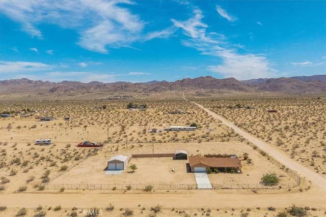 63357 Uranium Rd, Joshua Tree, CA 92252 - aerial view of sparsely populated area featuring a desert landscape and a mountain backdrop