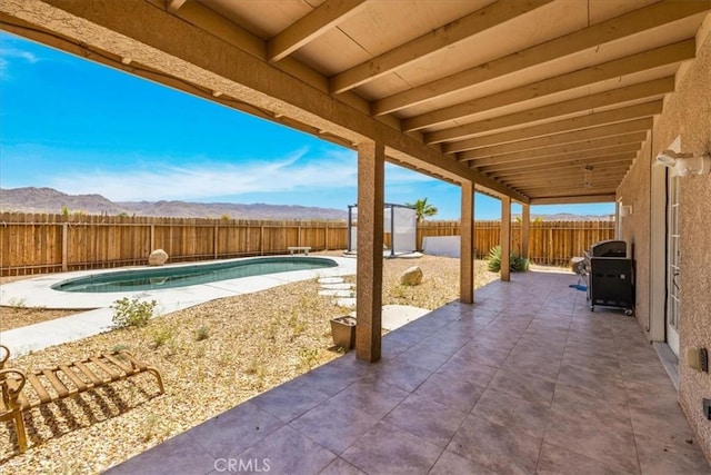 63357 Uranium Rd, Joshua Tree, CA 92252 - fenced backyard with a patio and a mountain view