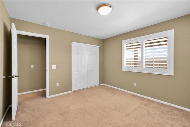 63357 Uranium Rd, Joshua Tree, CA 92252 - unfurnished bedroom with carpet flooring, baseboards, and a closet