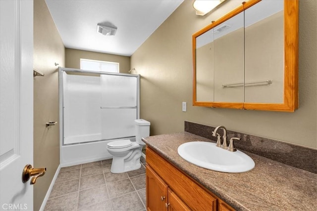 63357 Uranium Rd, Joshua Tree, CA 92252 - bathroom with vanity, shower / bathtub combination, toilet, tile patterned flooring, and baseboards