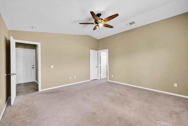 63357 Uranium Rd, Joshua Tree, CA 92252 - unfurnished bedroom featuring carpet floors, baseboards, lofted ceiling, and a ceiling fan