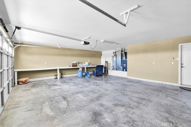 63357 Uranium Rd, Joshua Tree, CA 92252 - garage with gas water heater and a garage door opener