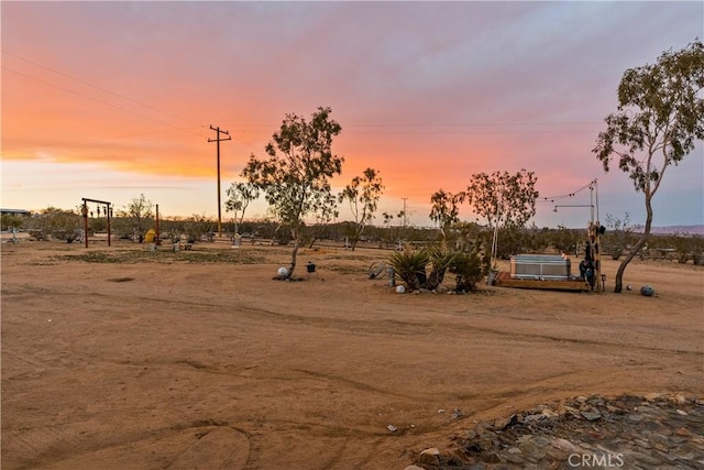 55436 Cone Blvd, Landers, CA 92285 - view of yard at dusk