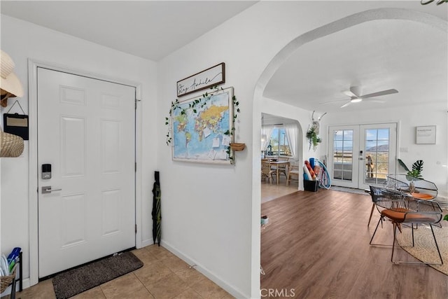 55436 Cone Blvd, Landers, CA 92285 - foyer featuring arched walkways, ceiling fan, and french doors