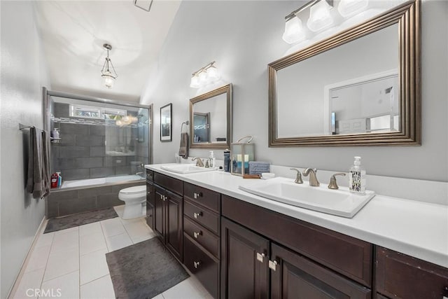 20660 Calle Feliz, Yorba Linda, CA 92886 - bathroom with double vanity, toilet, tile patterned floors, tiled shower / bath combo, and baseboards