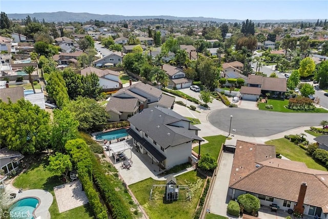 20660 Calle Feliz, Yorba Linda, CA 92886 - aerial perspective of suburban area featuring a pool and a mountain backdrop