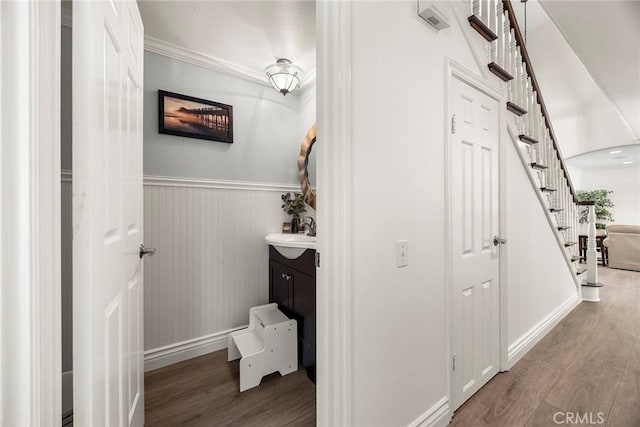 20660 Calle Feliz, Yorba Linda, CA 92886 - bathroom featuring wood finished floors, wainscoting, vanity, and crown molding